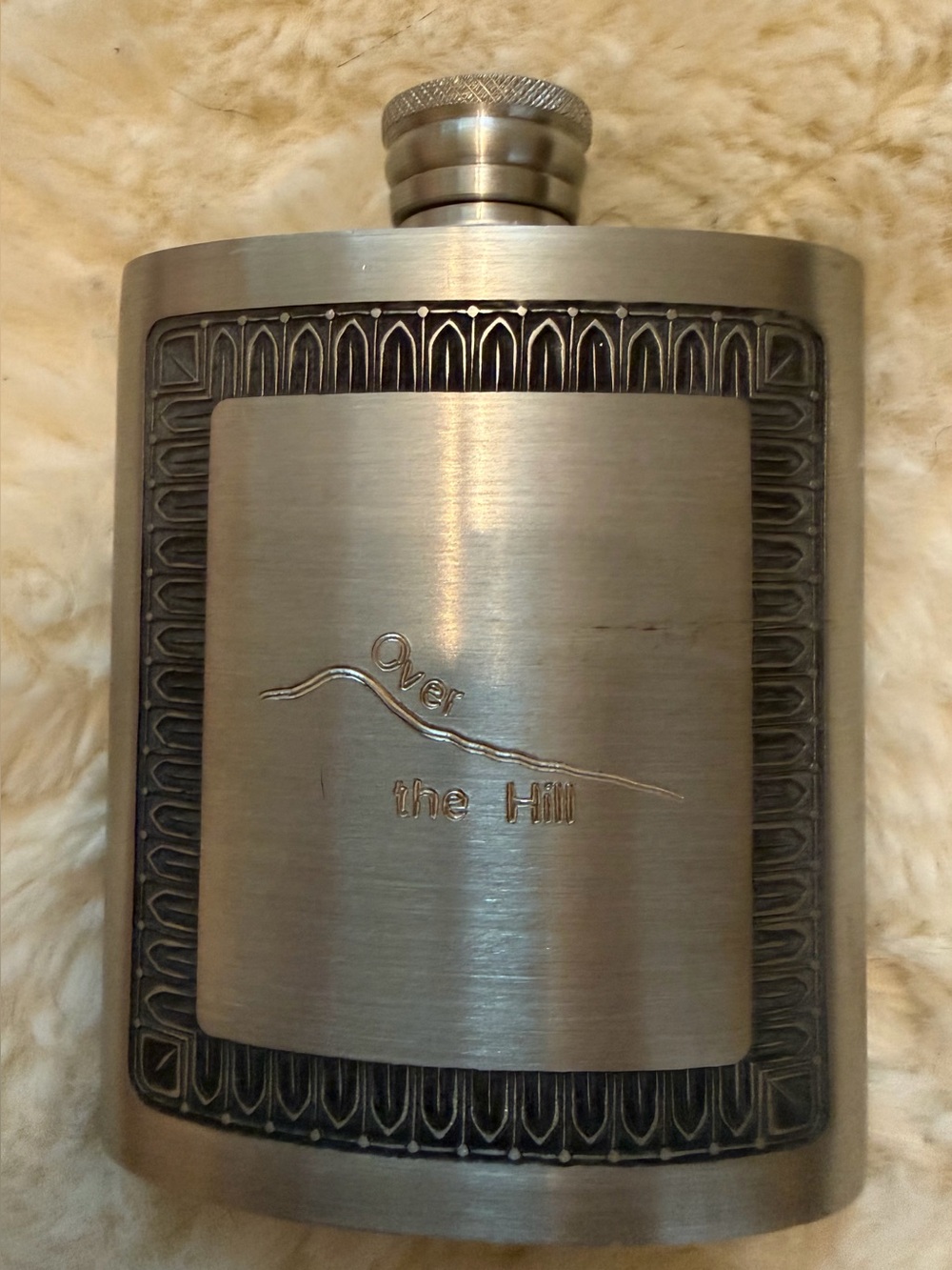 Unused Silver flask inscribed with “Over the Hill”